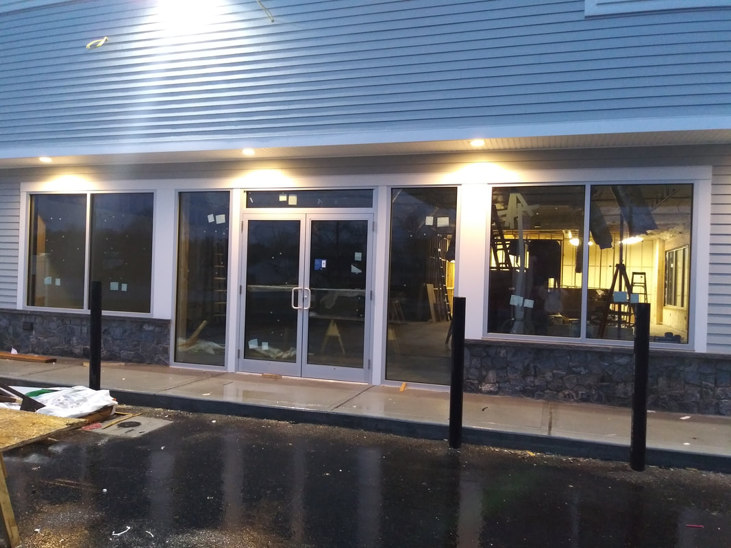 Mobil Gas Station — glazing by Skyline Glass & Glazing
