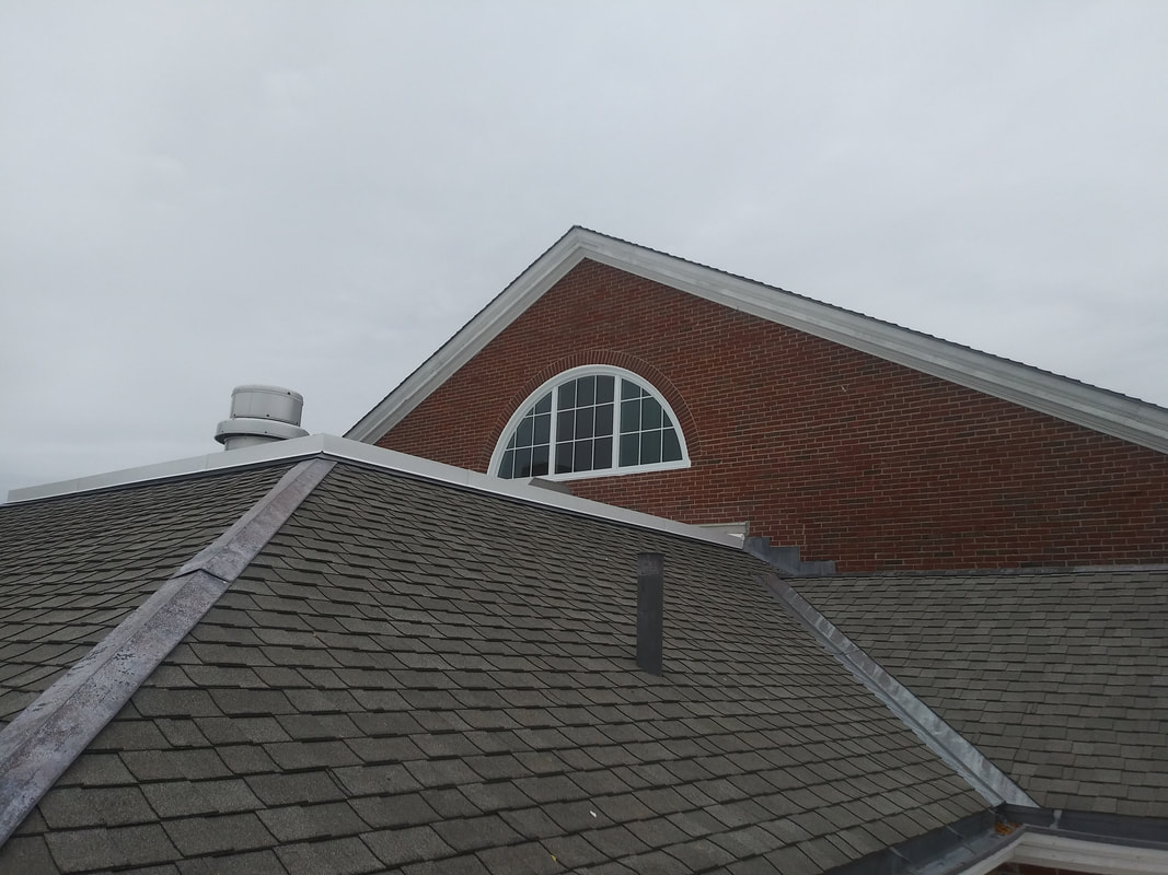 Tufts University — Arched Windows — glazing by Skyline Glass & Glazing